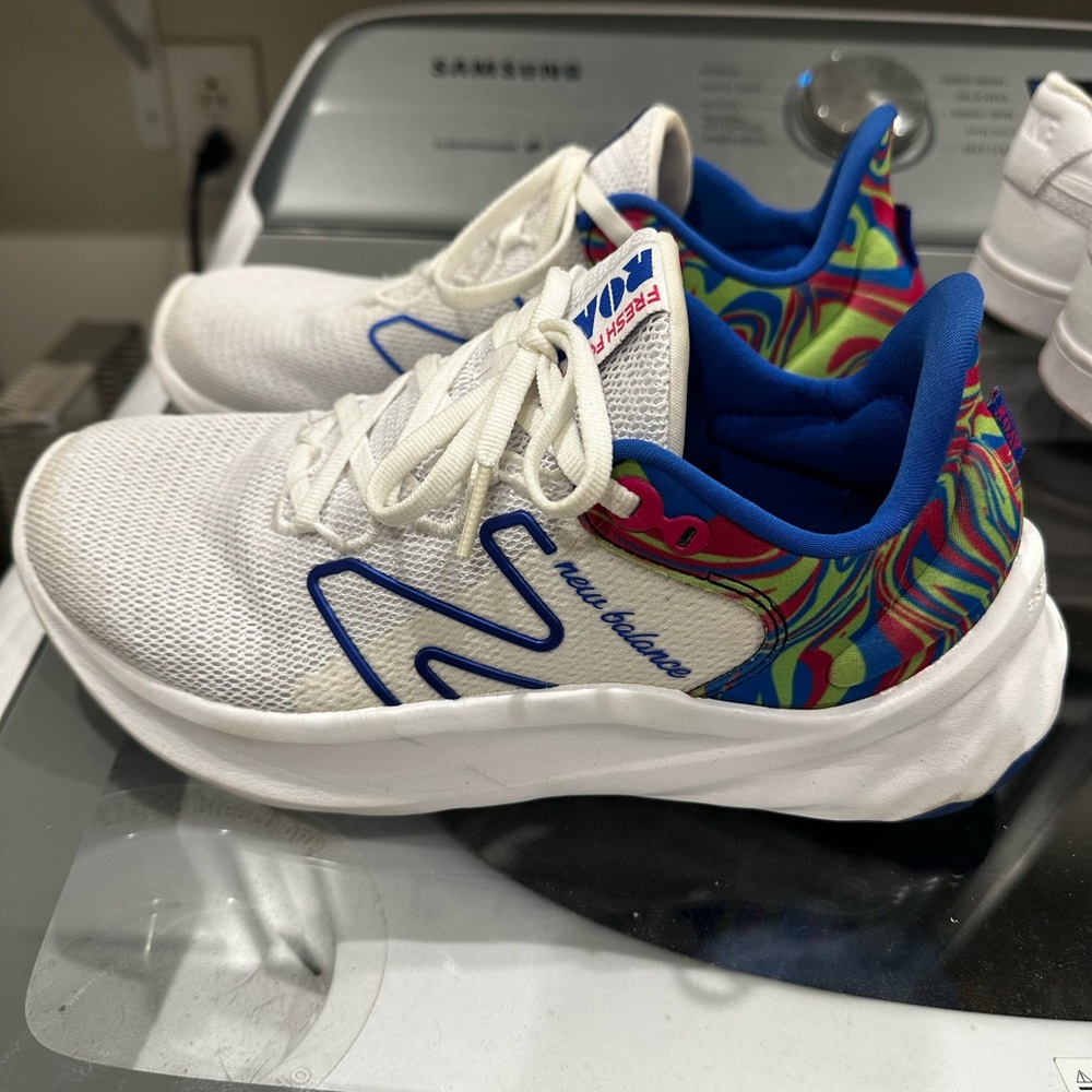 New Balance White and Blue Athletic Shoes with Colorful Pattern